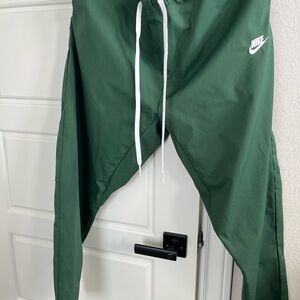 Nike Kids Green Joggers with White Accents